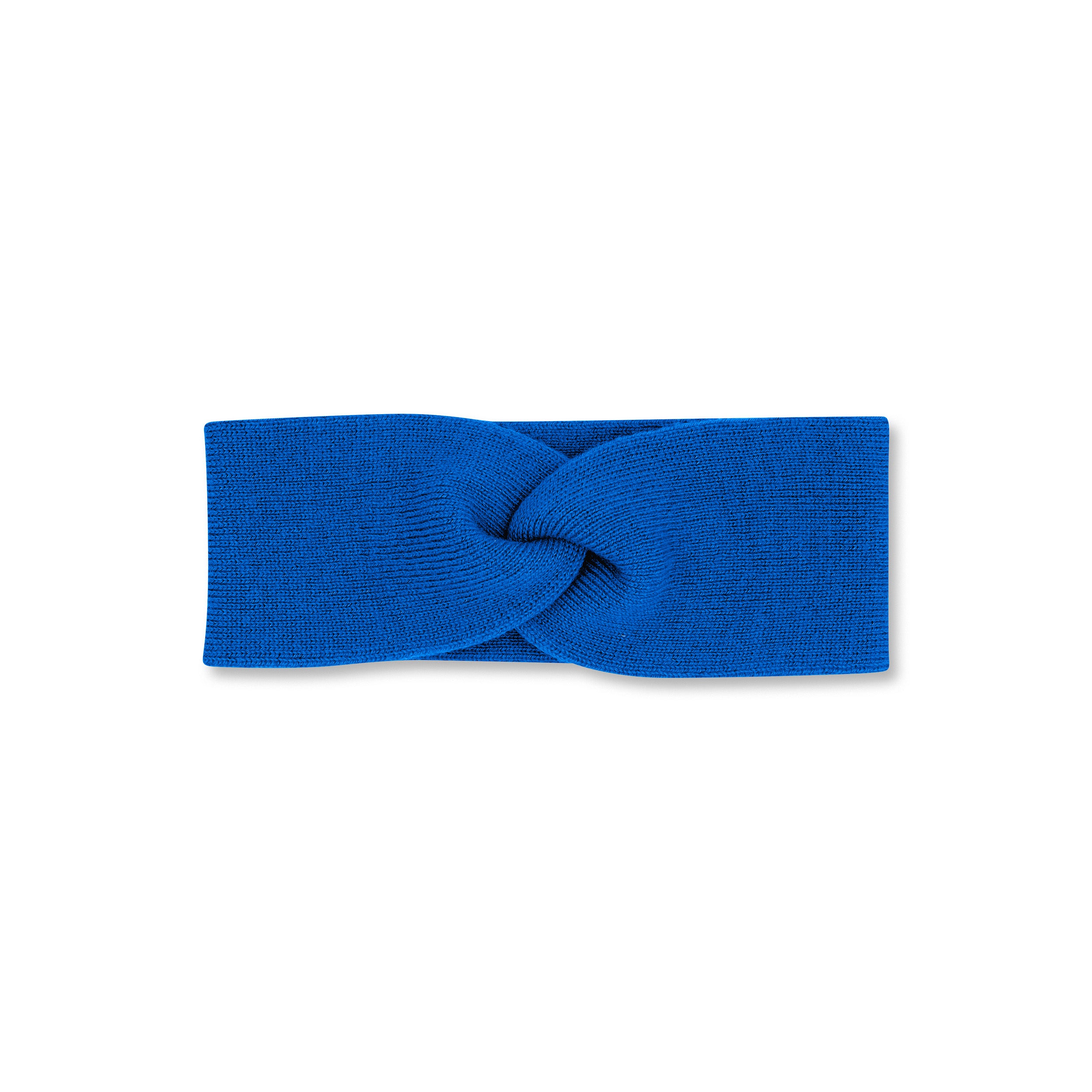 Product photo of a twisted cobalt blue headband, set against a plain background.