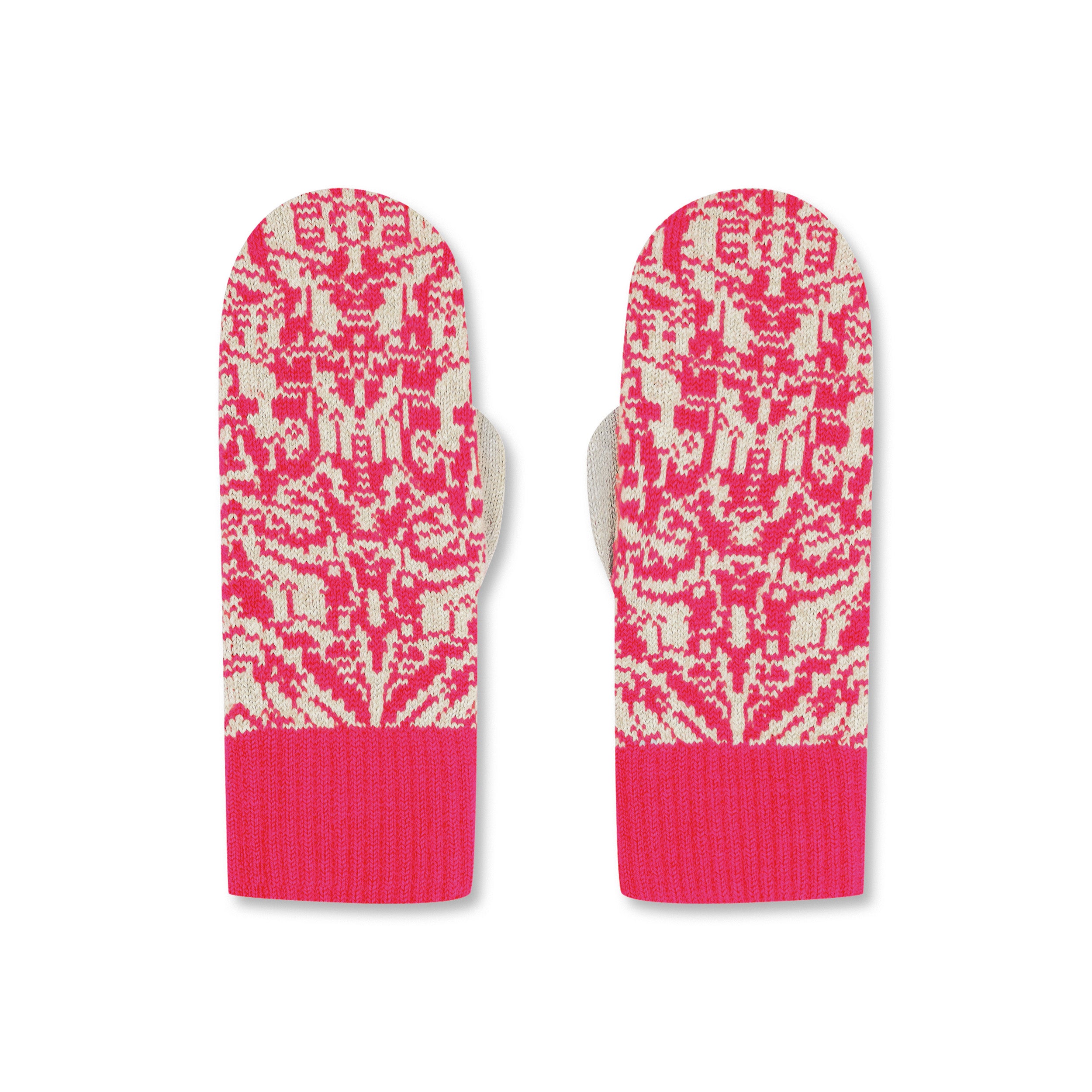 Product photo of a pair of bright pink and ecru mittens featuring an organic, nature-inspired pattern, laid flat on a neutral background.