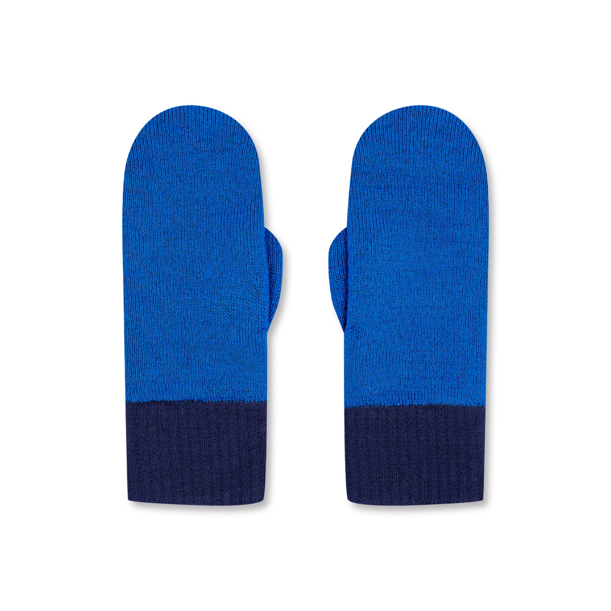 Product photo of a pair of cobalt blue merino wool mittens with indigo blue cuffs, laid flat on a neutral background.