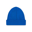 Product photo of a cobalt blue merino wool beanie, displayed on a neutral background.